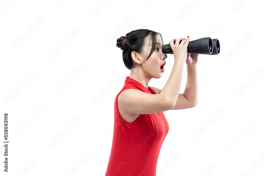 Asian Chinese woman in a cheongsam dress looking through binoculars Asian Chinese woman in a cheongsam dress looking through binoculars