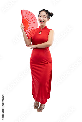 Obraz na plátně Asian Chinese woman in a cheongsam dress holding a red Chinese fan