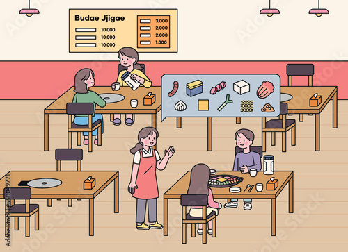 Korean budae jjigae restaurant. Customers are ordering food and the staff is explaining.