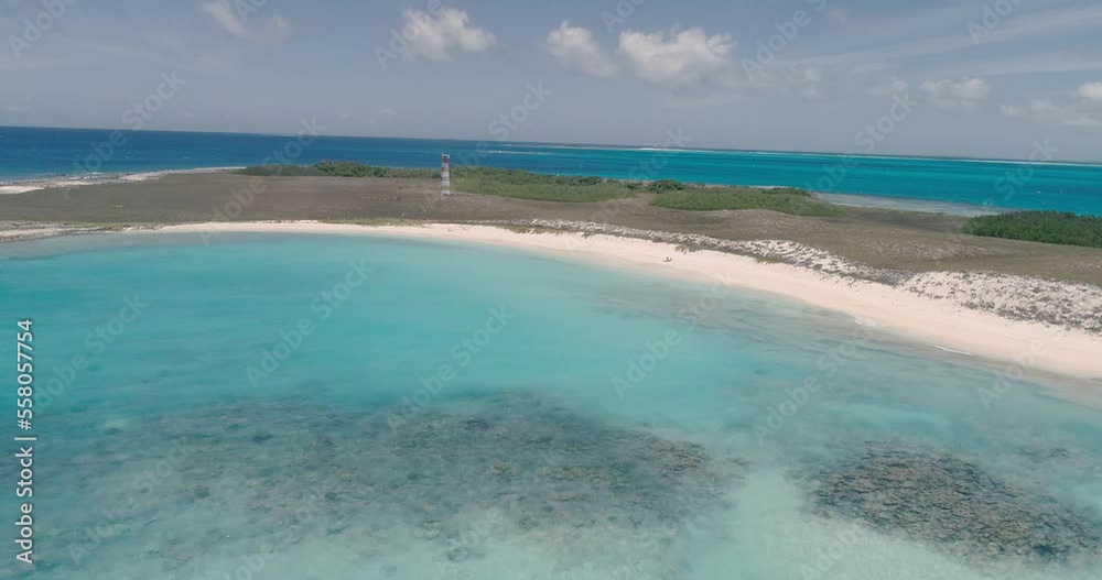 Lighthouse on white sand beach of Caribbean sea, Cayo de agua islans Los Roques - Summer Vacation Concept Lighthouse on white sand beach of Caribbean sea, Cayo de agua islans Los Roques - Summer Vacation Concept