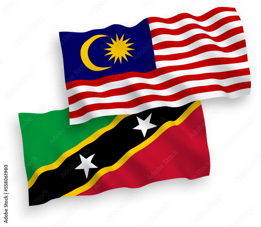 National vector fabric wave flags of Federation of Saint Christopher and Nevis and Malaysia isolated on white background. 1 to 2 proportion. National vector fabric wave flags of Federation of Saint Christopher and Nevis and Malaysia isolated on white background. 1 to 2 proportion.