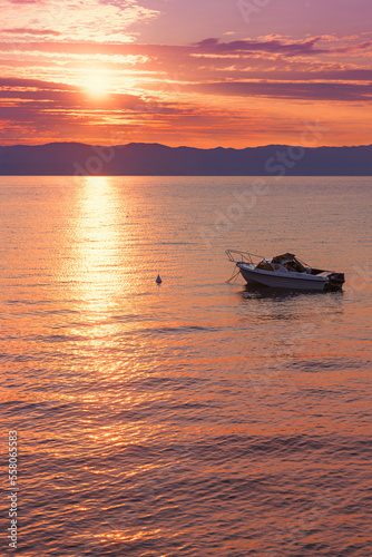 motorboat at Kvarner Bucht, adriatic ocean at sunset