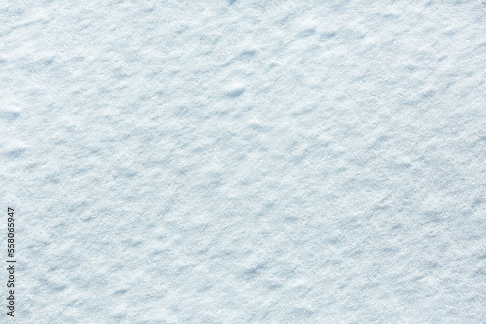 Texture of white sparkling snow covering ground. Uneven gleaming flat dunes. Lumpy rough coating sunshine snowdrifts. Glittering clear icy frozen snowflakes on bumpy light calm drifts for 3D design
