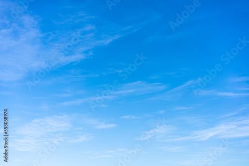 Blue Bright Day Sky with Scattered Fluffy Soft Clouds