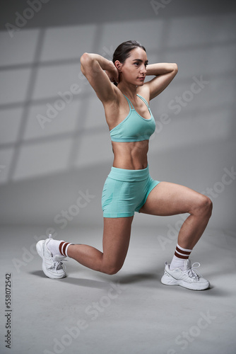 Fitness woman doing leg workout  lunges