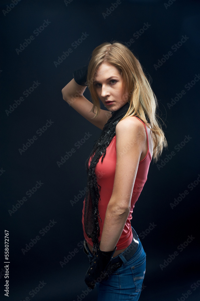 Young sexy slim woman with scarf over black