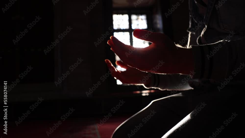 Muslim man praying with raising hands in the mosque. Islamic or ramadan background 4K video. Muslim man praying with raising hands in the mosque. Islamic or ramadan background 4K video.