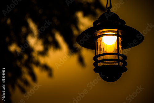 Lamps shine brightly at night.
