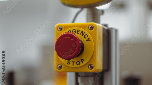 Yellow emergency button factory indoor photo