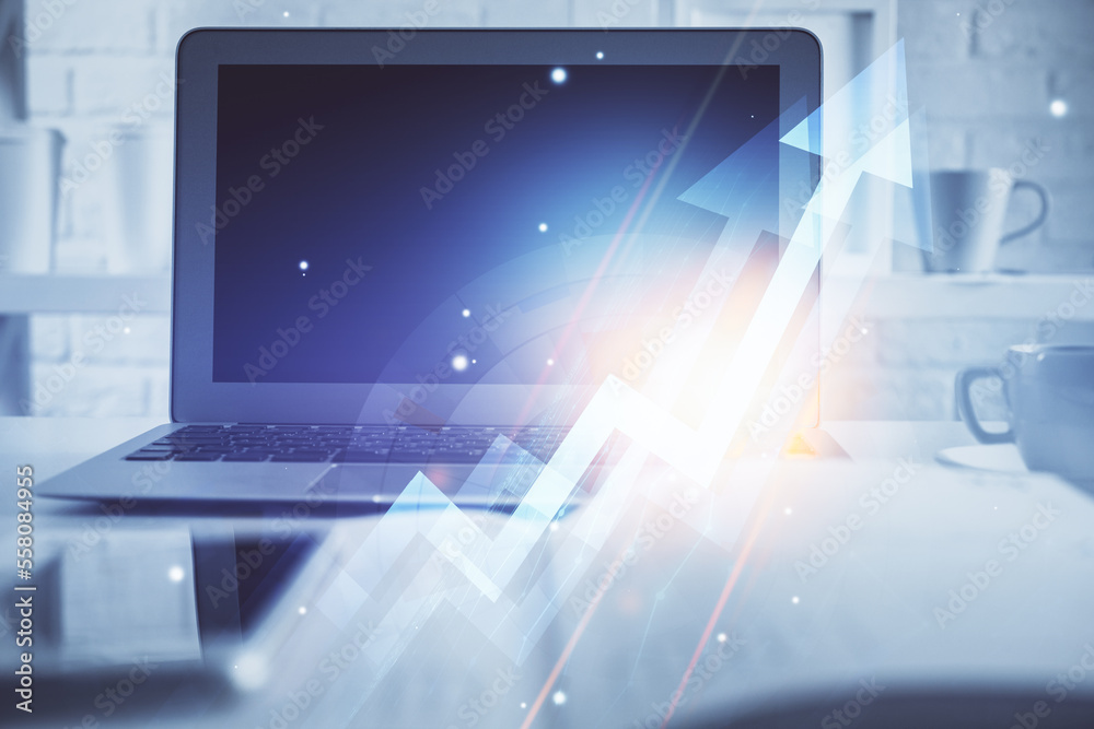 Computer on desktop with point up arrows hologram. Double exposure. Concept of success. Computer on desktop with point up arrows hologram. Double exposure. Concept of success.