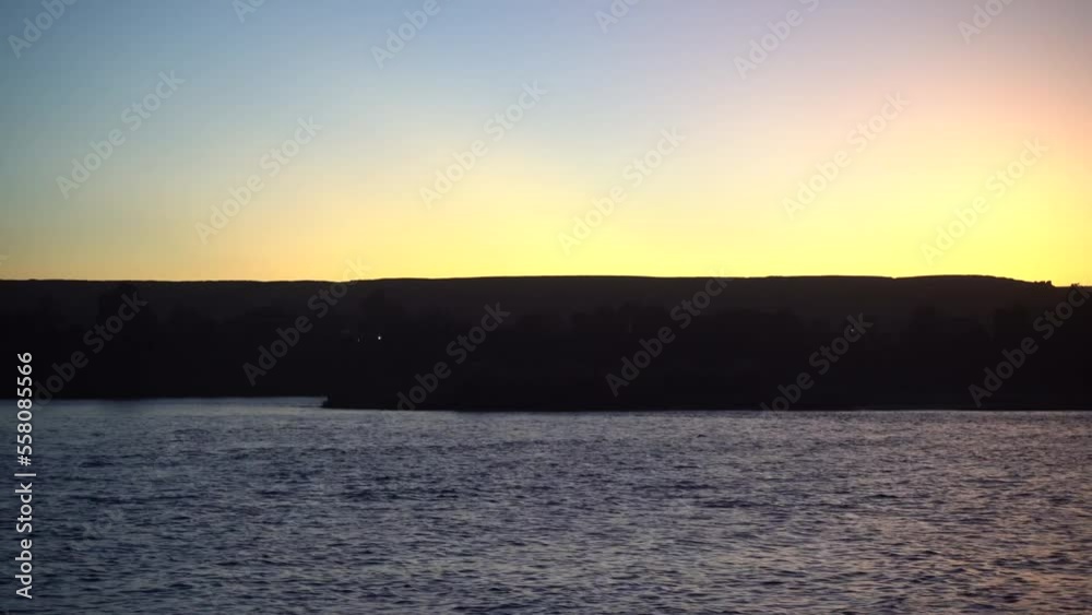 Gorgeous Magic Hour along Nile River Banks in Luxor Egypt Gorgeous Magic Hour along Nile River Banks in Luxor Egypt