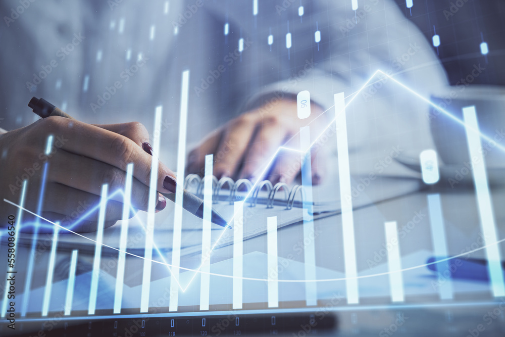 Double exposure of woman's hands making notes with forex graph hologram. Concept technical analysis. Double exposure of woman's hands making notes with forex graph hologram. Concept technical analysis.