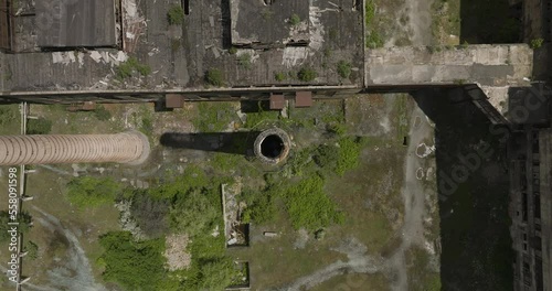 Top View Of Old Factory Smokestack In Abandoned Industrial Area In Khashuri, Georgia. aerial photo