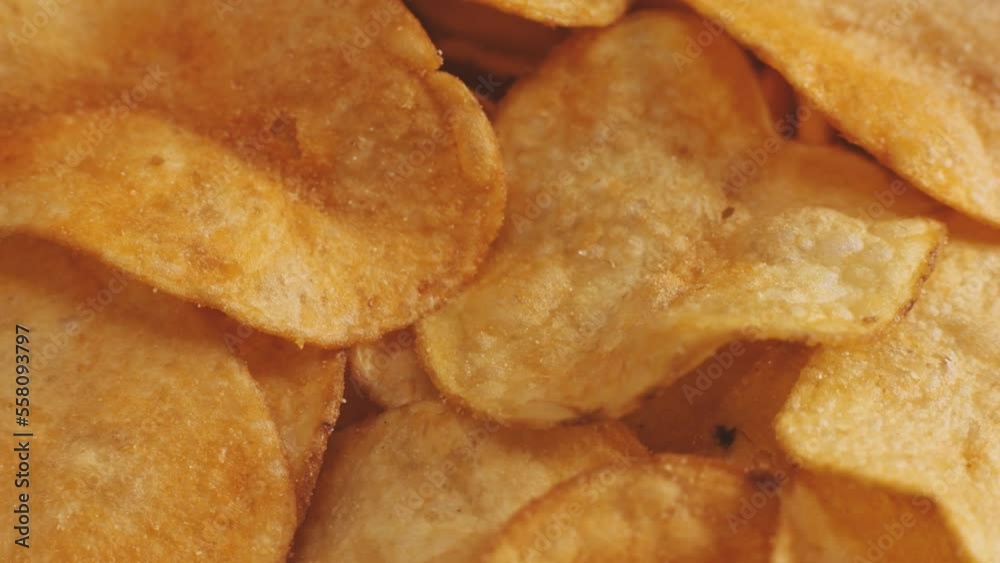 Fresh potato chips. Macro, selective focus Fresh potato chips. Macro, selective focus