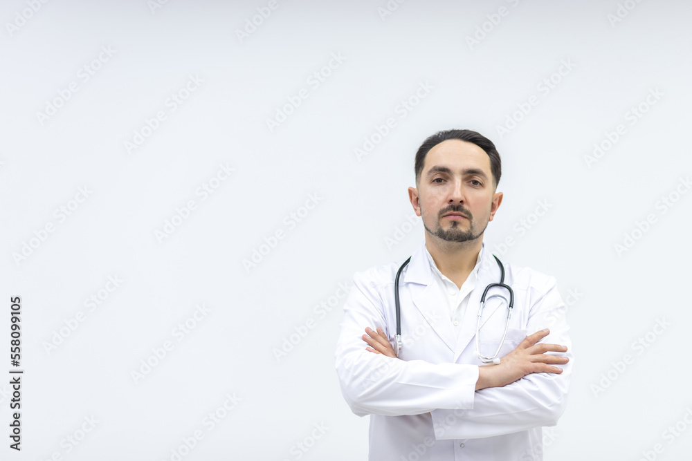 Close up photo of male mature doctor posing at camera with a stethoscope. Close up photo of male mature doctor posing at camera with a stethoscope.