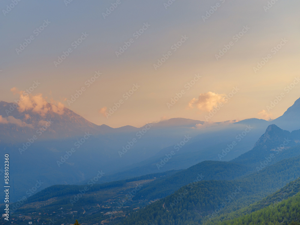 Turkey travel, mediterranean area on a warm summer day, sunset over mountains and valley under Kemer, Antalya province. Lycian trail