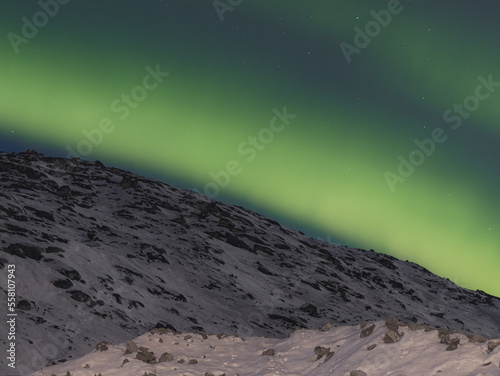 northern lights over the mountain