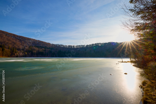 Beautiful landscape with St. Ana Lake in Romania, volcanic lake in December. photo