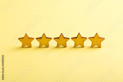 Five Stars Business Concept with Yellow Background