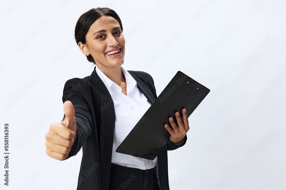 Business woman folder with documents in black business suit shows signals gestures and emotions on white background, freelancer job online time management Business woman folder with documents in black business suit shows signals gestures and emotions on white background, freelancer job online time management