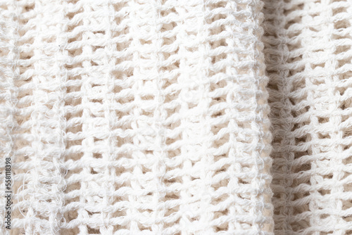 White crochet texture close up.Cotton mesh fabric for clothing