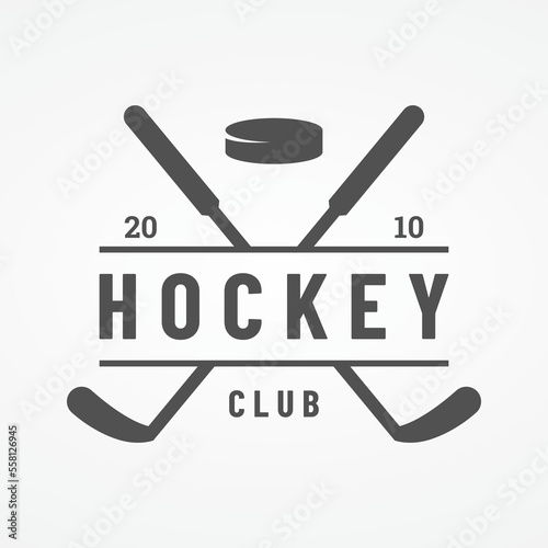 ice hockey sport badge template with hockey ball and stick.For club, tournament,emblem,championship and business.
