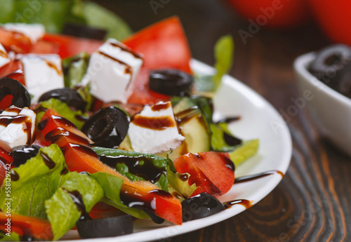 Traditional Greek salad with feta, olives and vegetables