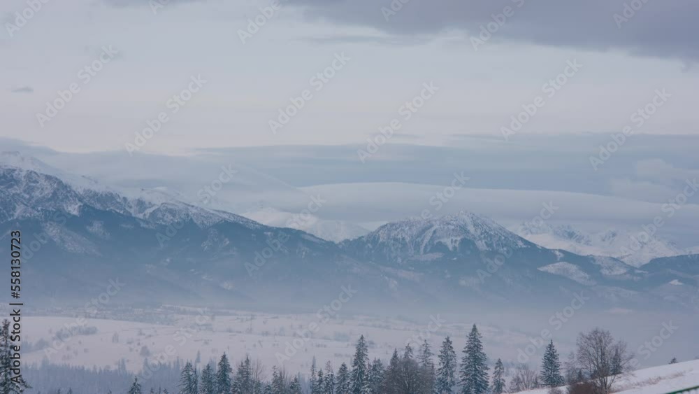 TIMELAPSE Establishing shot, view of beautiful Tatra mountain range on a Poland and Slovakia border before sunrise TIMELAPSE Establishing shot, view of beautiful Tatra mountain range on a Poland and Slovakia border before sunrise