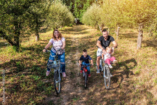 Family On Cycle Ride In Countryside