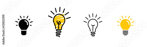 Linear Glowing light bulb on white background. Set icon in Doodle style. photo