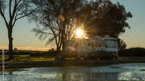 Camping in motorhome along the water edge