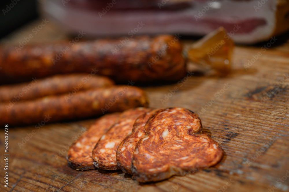 dried sausage on a wooden board dried sausage on a wooden board