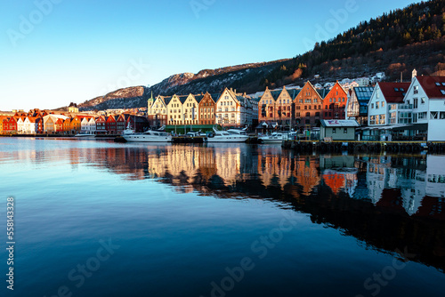 Famous Bryggen street with historical wooden colored houses. Hanseatic wharf in Bergen, Norway. UNESCO World Heritage Site.