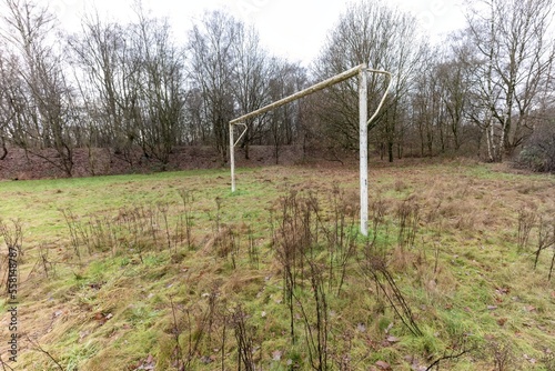 a desolate football  field in the morning 