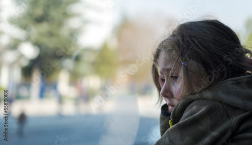 Profile photos of little girl looking away. Selective Focus Face