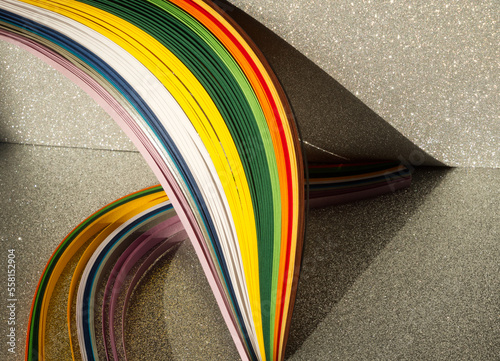 Abstract paper. Colorful rainbow strip wave paper on sparkling silver background. Abstract paper texture. Minimalist abstract concept. Template or layout for card, print, poster. Infinity arc.