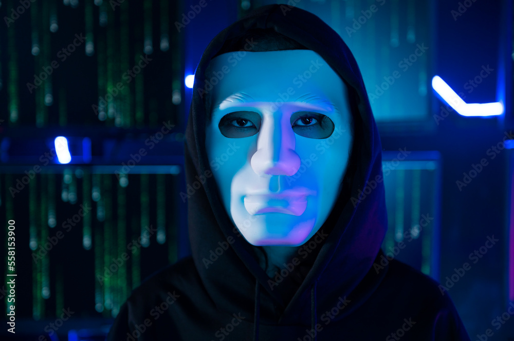 A Hacker is using laptop computer to steal data in the night A Hacker is using laptop computer to steal data in the night