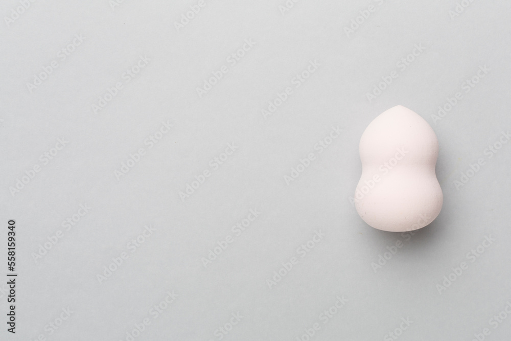 Beauty blender on color background, top view Beauty blender on color background, top view