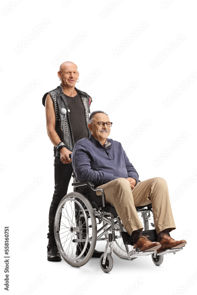 Punk standing behind a mature man in a wheelchair