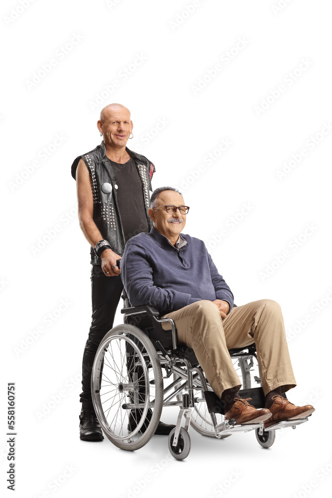 Punk standing behind a mature man in a wheelchair Punk standing behind a mature man in a wheelchair