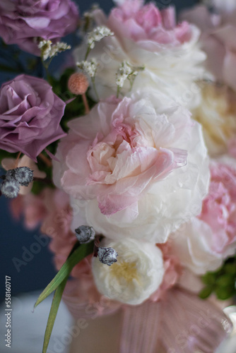 Beautiful flowers. Preserved roses with dried flowers bouquet closeup. Beautiful flower arrangement in a pink box. © Kseniya