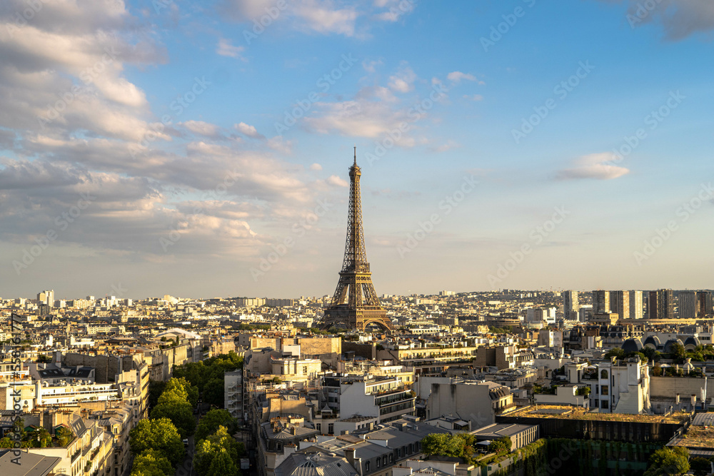 View of the Eiffel Tower from the Arch of Triumph during sunset