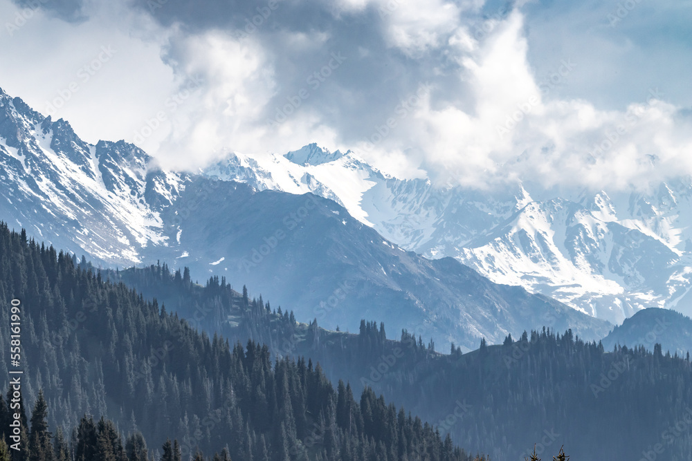 Scenery view of snow covered mountain landscape in sumer day.