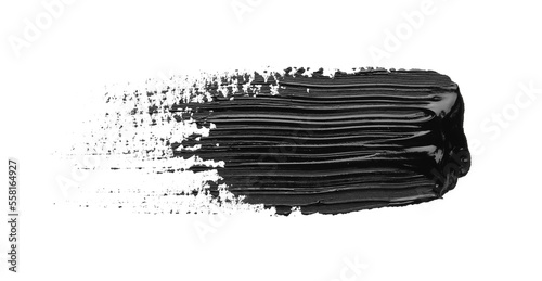 Fotobehang Brushstroke of black oil paint on white background, top view