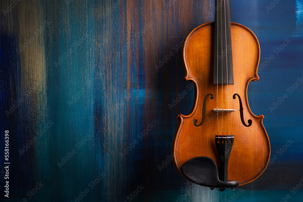 Vintage violin on abstract art colored background. - obrazy, fototapety, plakaty 
