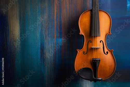 Canvas Print Vintage violin on abstract art colored background.
