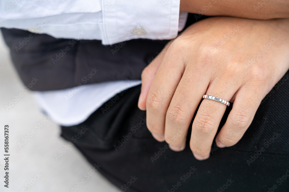 hands of the groom