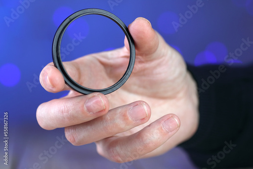 reduction ring for the lens filter held in the hand