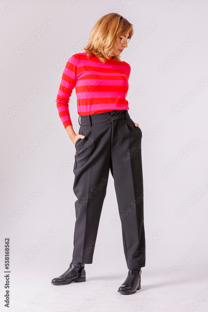 Executive blonde model over 50 years in photo studio Executive blonde model over 50 years in photo studio