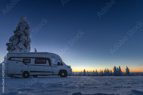 Print op canvas Overnight stay in the camper with wonderful winter landscape